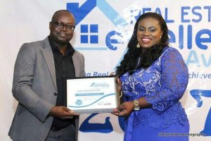 Funke Kehinde receiving an award